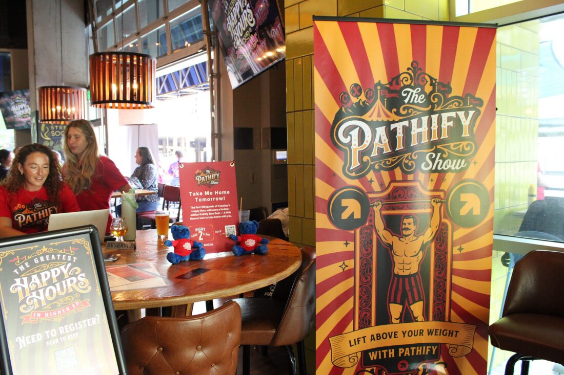 Higher education professionals networking at a past Pathify happy hour