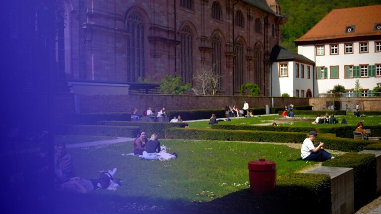 Students scattered across a campus lawn, tinted in Pathify purple — article: Just 28% of Students Find Groups