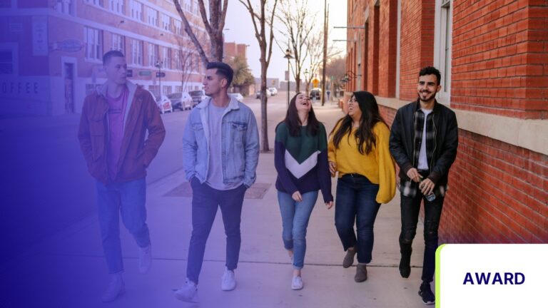 Pathify Wins Platinum in Campus Technology’s 2025 Product of the Year Award for Campus Experien — Award news tile, campus photo tinted in Pathify purple